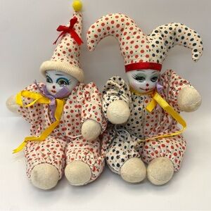 Vintage sandbag clowns, porcelain faces